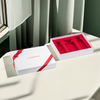 Coffret cadeau en carton de luxe personnalisé avec noeud rouge
